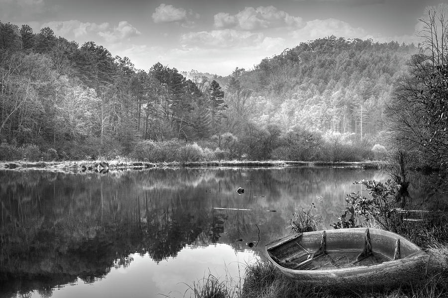Rowboat on the Lakeshore Black and White Photograph by Debra and Dave Vanderlaan