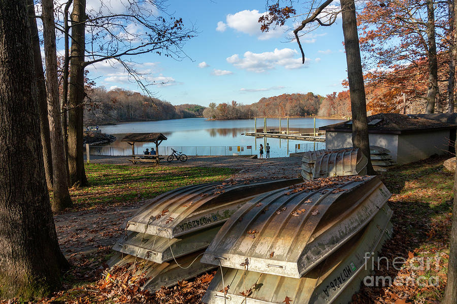 Rowboats are in storage in autumn at Lake Needwood in Rockville, Photograph by William Kuta