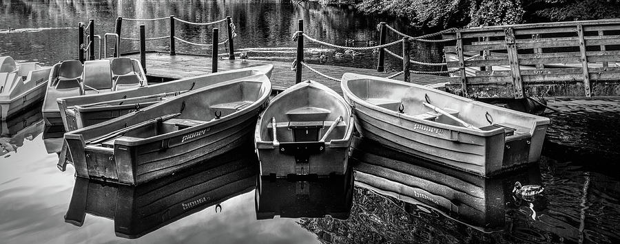 Rowboats in the Lake Panorama in Black and White Photograph by Debra and Dave Vanderlaan