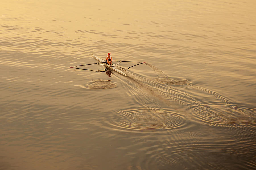 Rower Making Ripples on the Water Photograph by Bill Cannon