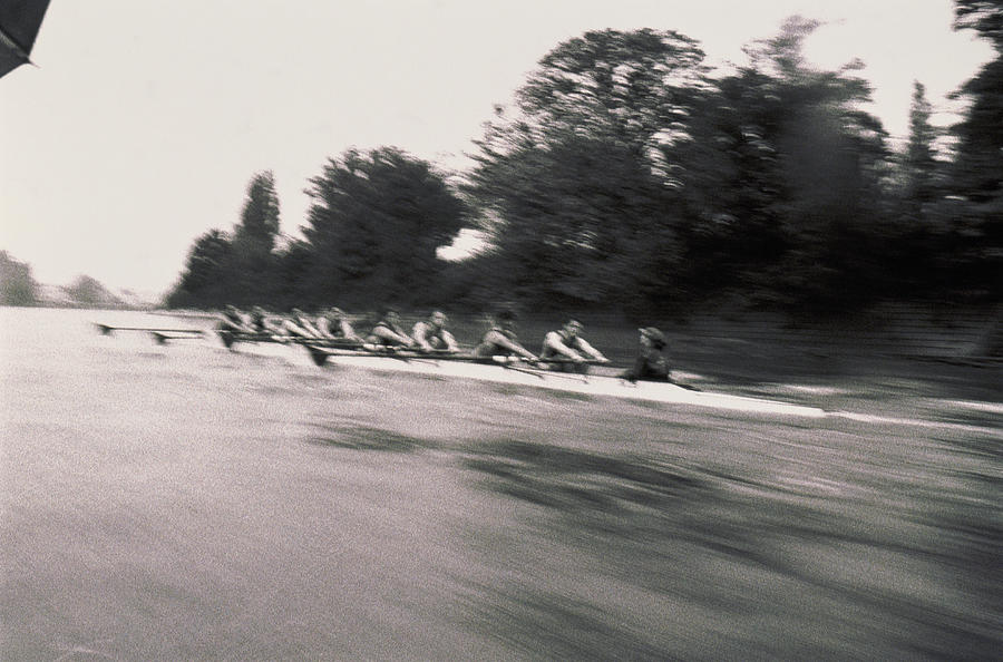 Rowing team on river (B&W, blurred motion) Photograph by VCL/Alistair Berg