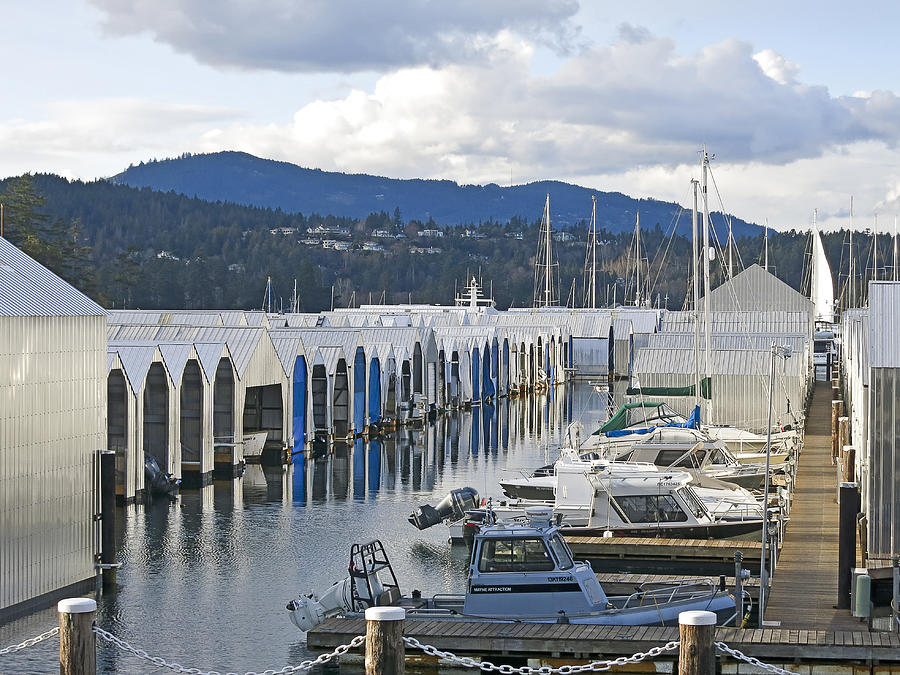 Rows of Boats & Steel Boathouses With Background Landscape, Vancouver Island, BC Photograph by Silentfoto