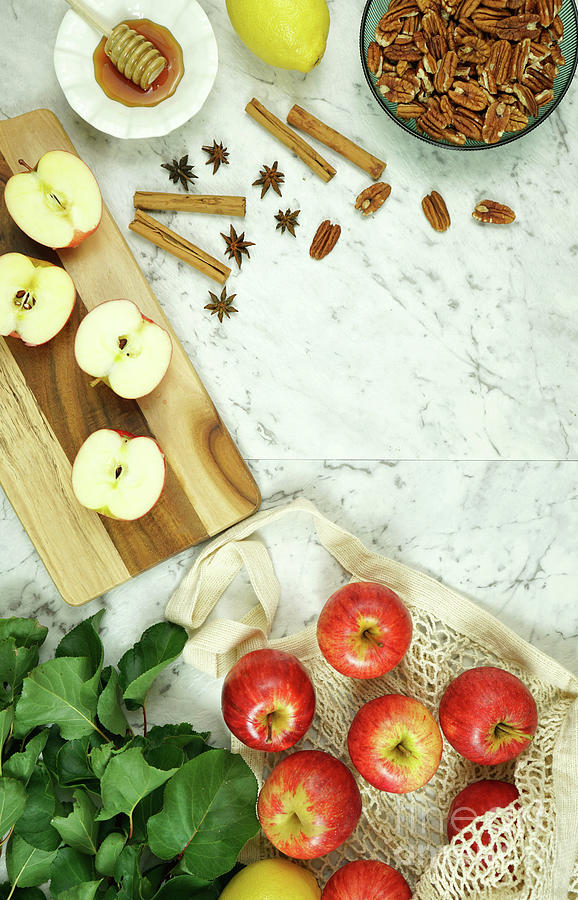Royal Gala apples with honey and spices preparation for cooking and baking. Photograph by Milleflore Images