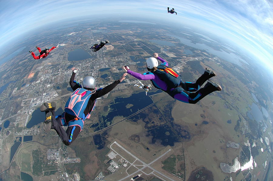 Royalty Free Stock Photo:  Women Skydiving - Flying High Photograph by Dzphotovideo