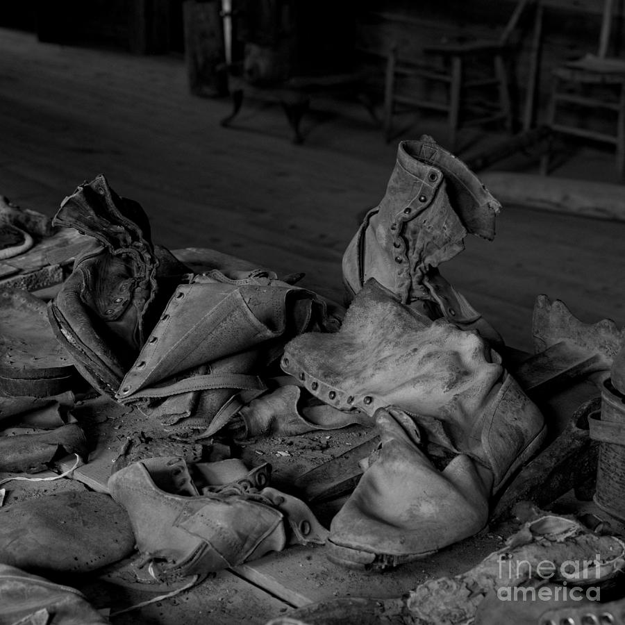 Rubble of Vintage Boots BW Photograph by Kae Cheatham