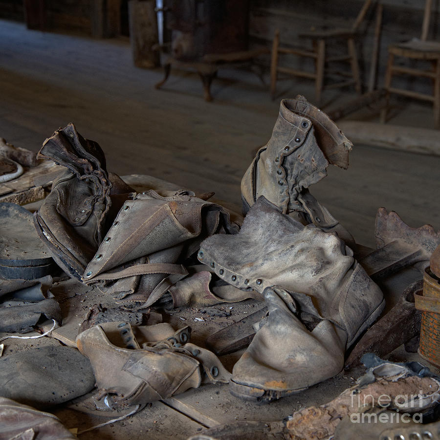 Rubble of Vintage Boots Photograph by Kae Cheatham