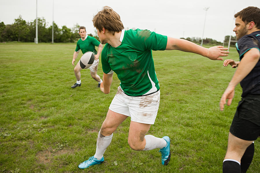 Rugby game in action Photograph by Image Source