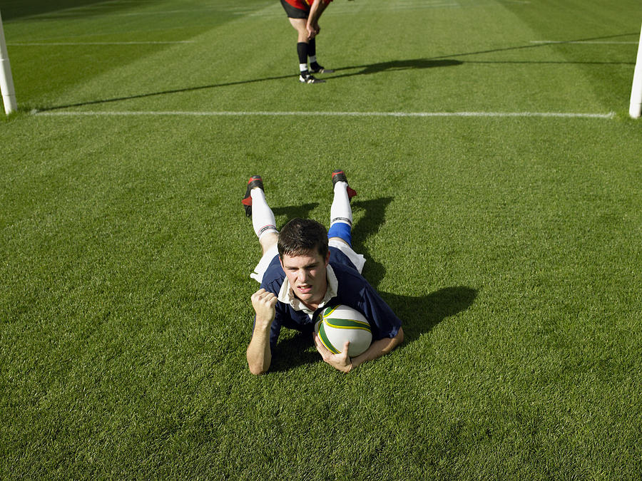Rugby player scoring a try Photograph by Image Source