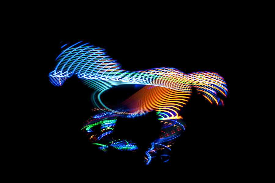 Running horse with light trail texture on black Photograph by Colormos