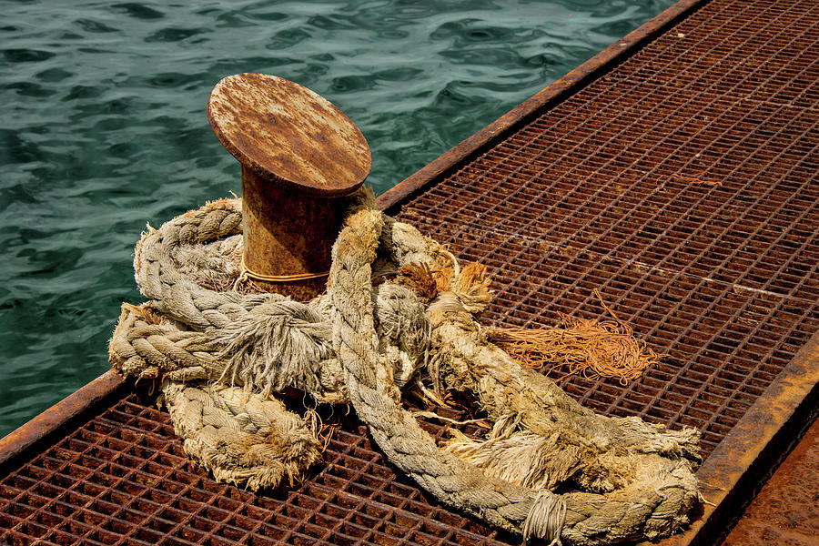 Rust And Ropes Photograph by Xavier Cardell