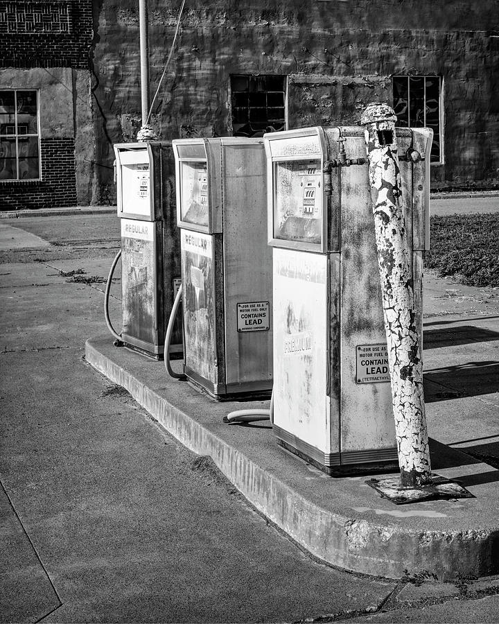 Rusted Old Gas Pumps Black and White Photograph Photograph by Ann Powell