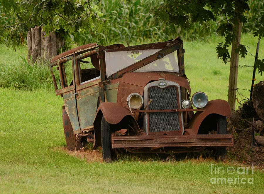 Rusted Out Old Chevrolet Photograph by Scott Ward