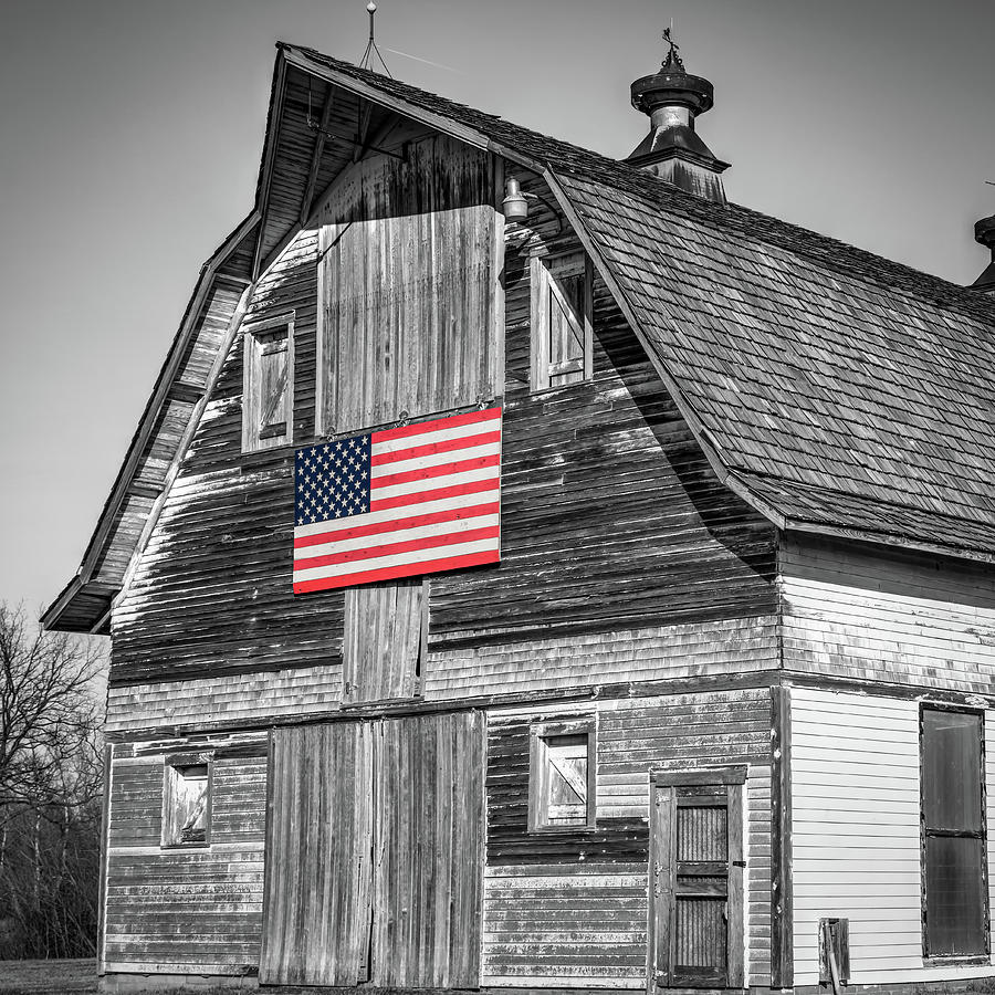 Rustic Barn And Old Glory - Selective Color Photograph by Gregory Ballos