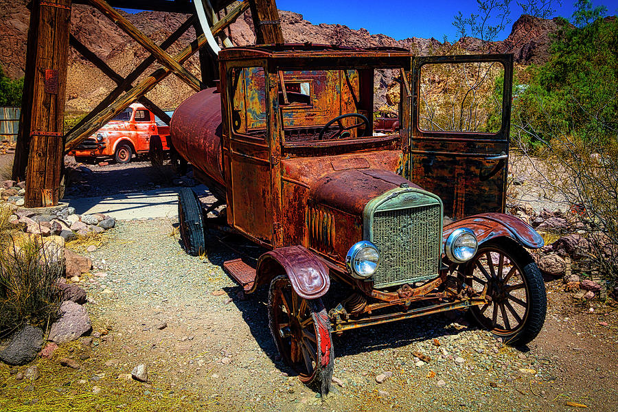 Rusting In The Desert Photograph by Garry Gay