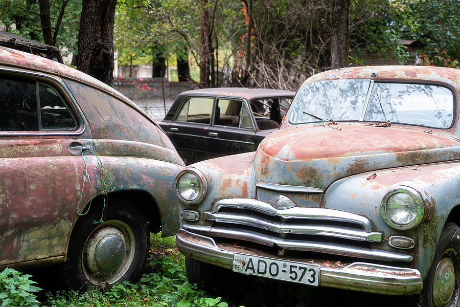 Rusty Abandoned Car Photograph by Roman Robroek