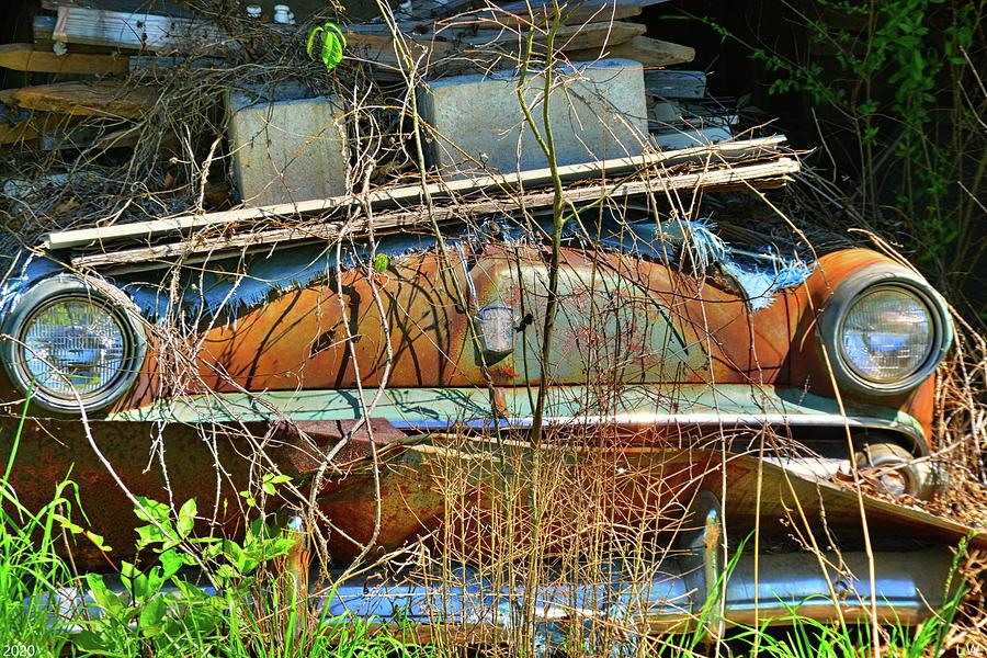 Rusty Barn Find Photograph by Lisa Wooten