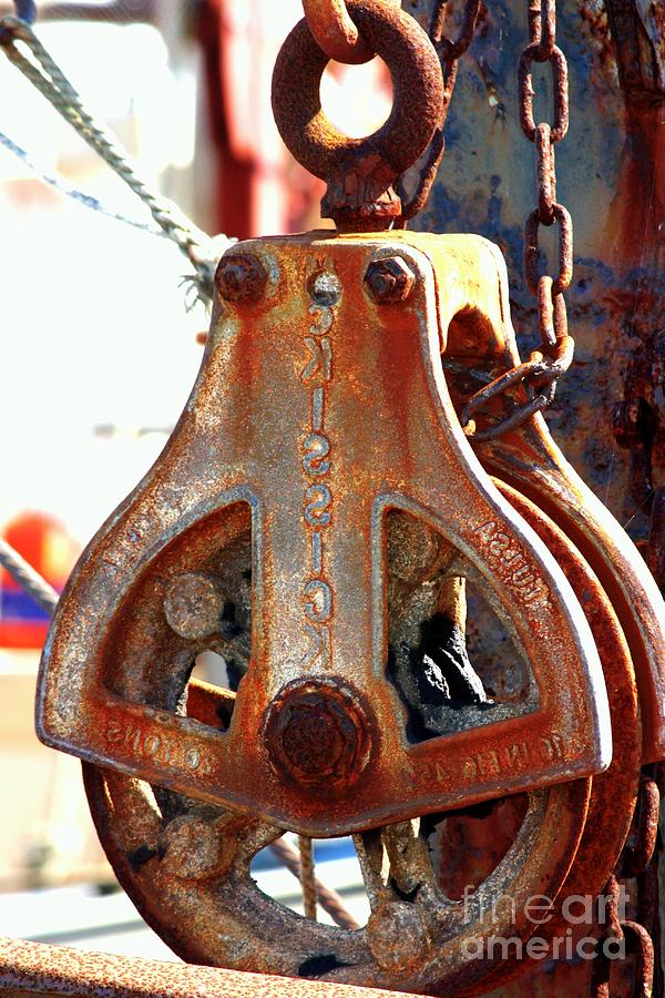 Rusty Boat Pully Photograph by Carol Groenen