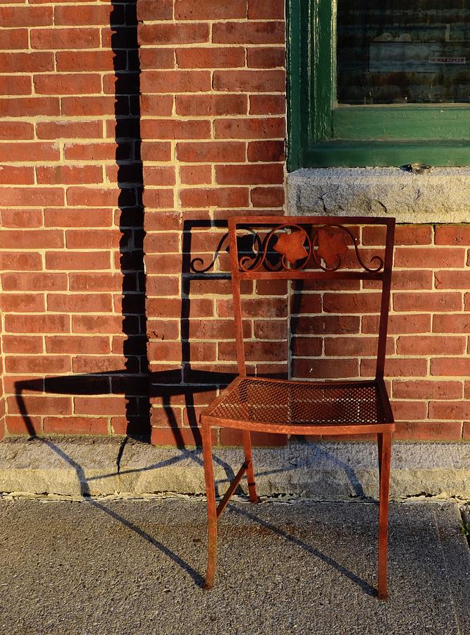 Rusty chair at sunset Photograph by Corinne Rhode