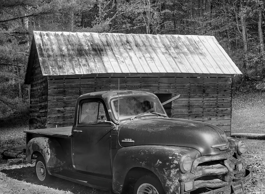 Rusty Chevy at the Farm Barn Black and White Photograph by Debra and Dave Vanderlaan