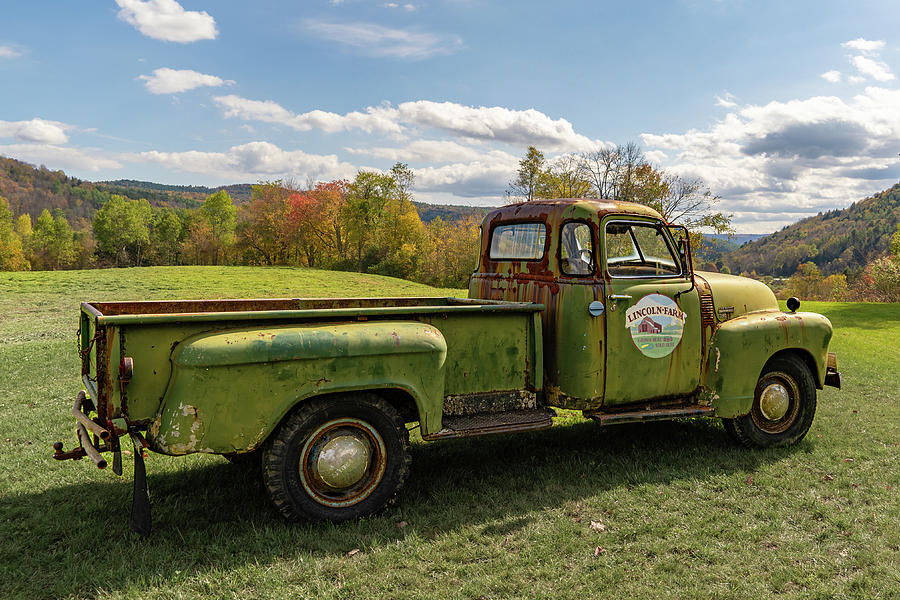 Rusty green truck on Lincoln Farm Photograph by Daniel Brinneman