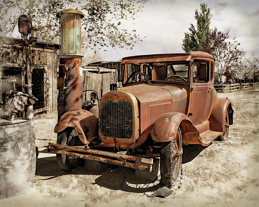 Rusty Model A Photograph by Jerry Cowart