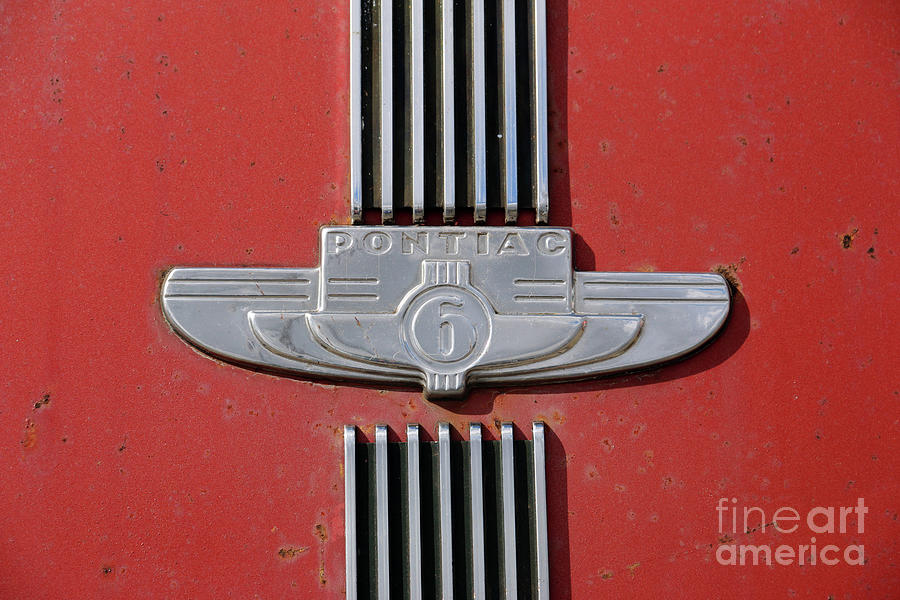 Rusty Old 1937 Pontiac 6 Emblem  4578 Photograph by Jack Schultz