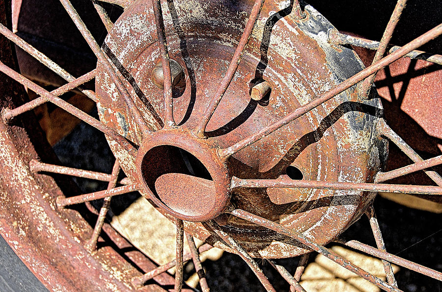 Rusty Spoke Wheel Photograph by David Lawson