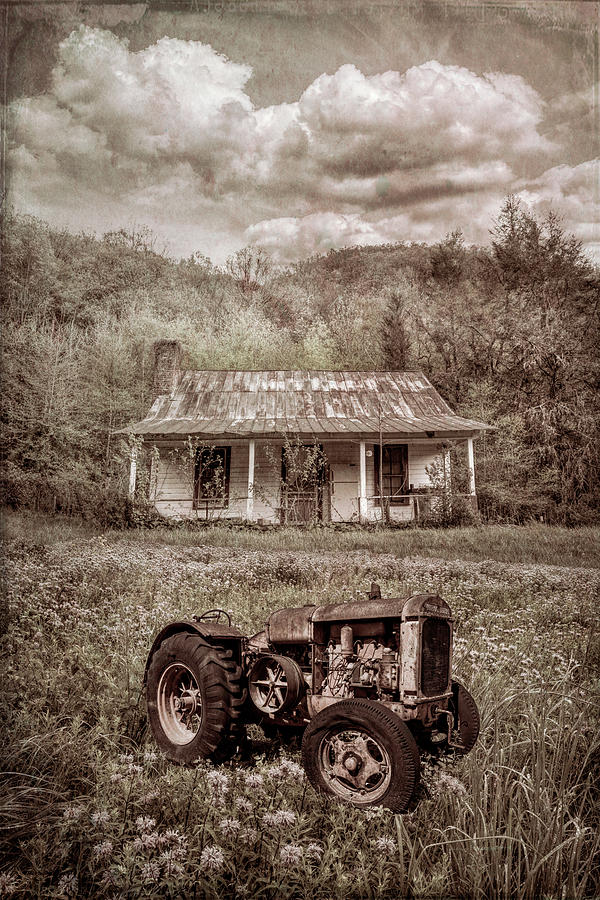 Barn Photograph - Rusty Tractor in the Wildflowers in Vintage Sepia by Debra and Dave Vanderlaan