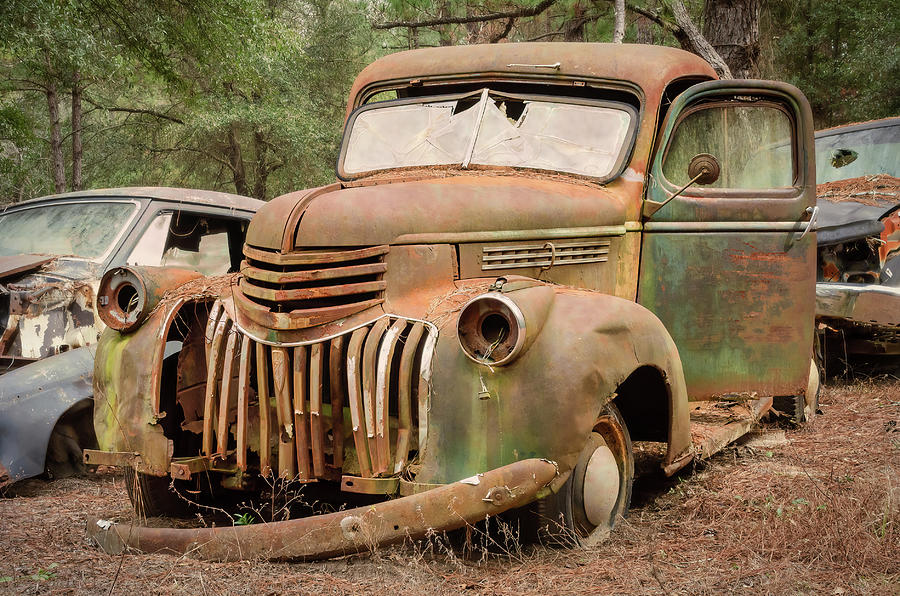 Rusty Truck-1 Photograph by John Kirkland