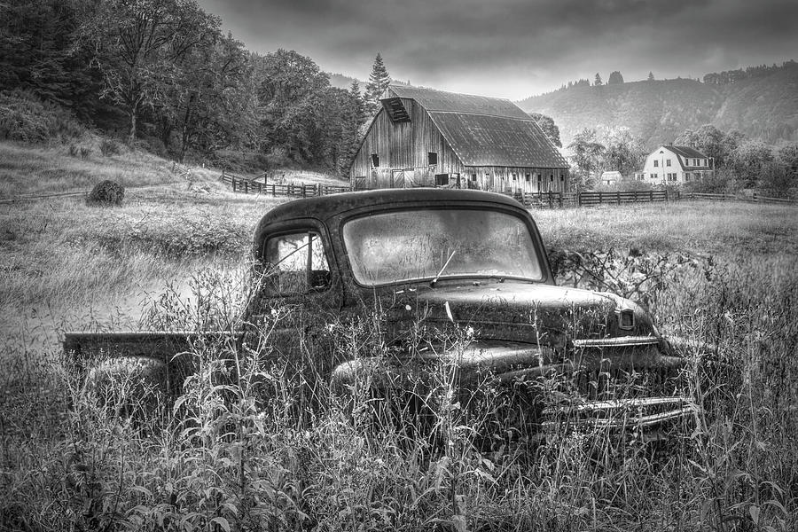 Rusty Truck Deep in the Wildflowers in Black and White Photograph by Debra and Dave Vanderlaan