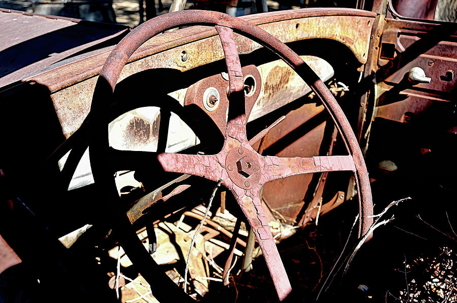 Rusty Wheel Photograph by David Lawson
