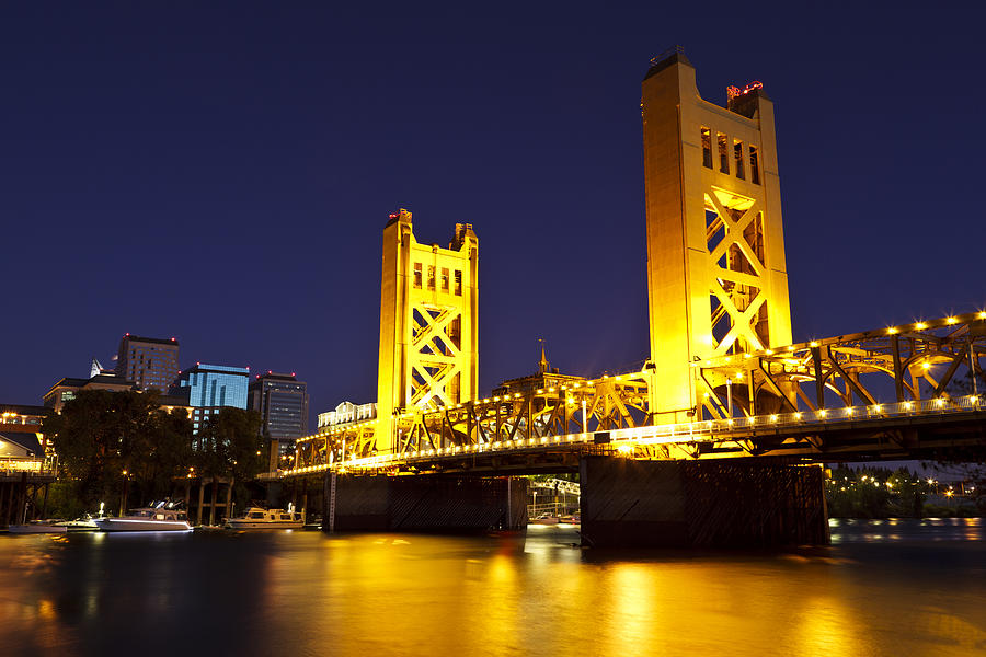 Sacramento River and Tower Bridge at late dusk Photograph by PictureLake