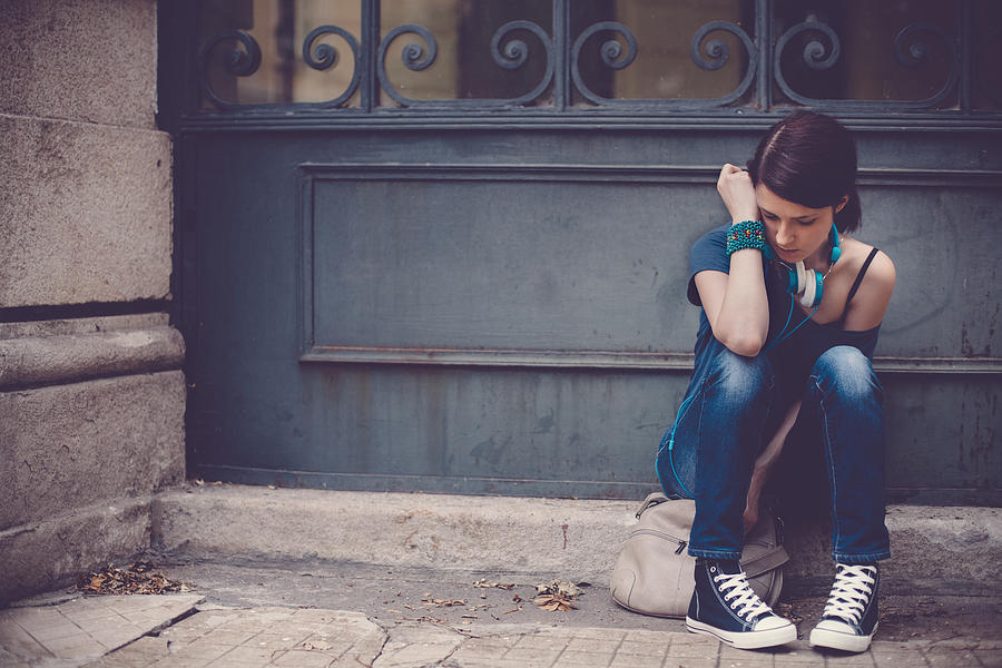 Sad teenage girl outside Photograph by Martin-dm