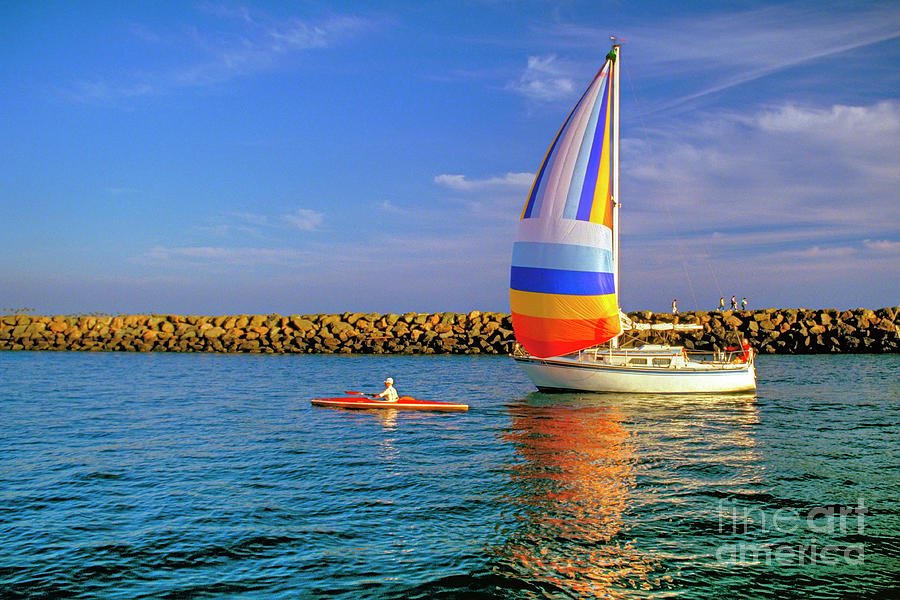 Sailboat and Kayak Going Home Photograph by David Zanzinger