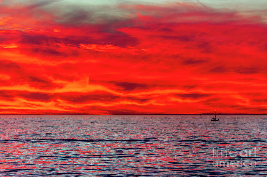 Sailboat in Oceanside at sunset. Photograph by Rich Cruse