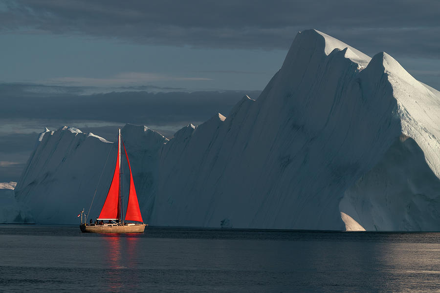 Sailboat in the low setting sun in Greenland Photograph by Anges Van der Logt