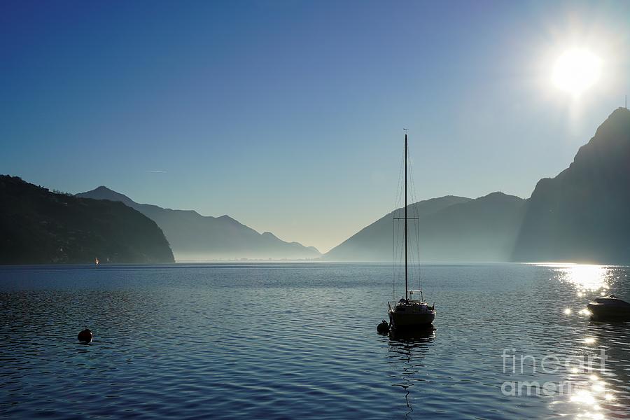 Sailboat On Lake Lugano. Switzerland Photograph by Claudia Zahnd-Prezioso