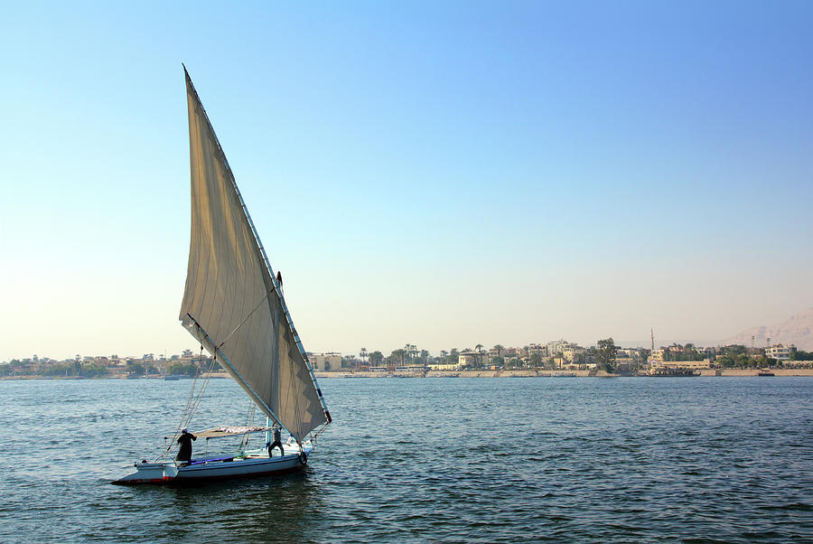 Sailboat Sailing On The River Photograph by Mikhail Kokhanchikov