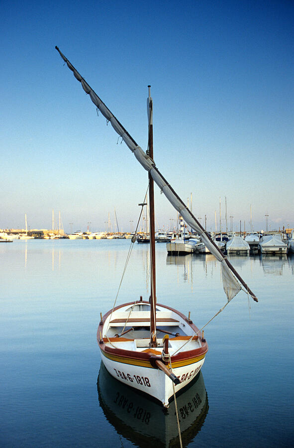Sailing boat at harbour of Montgri, Costa Brava, Catalonia, Spain Photograph by Mel Stuart