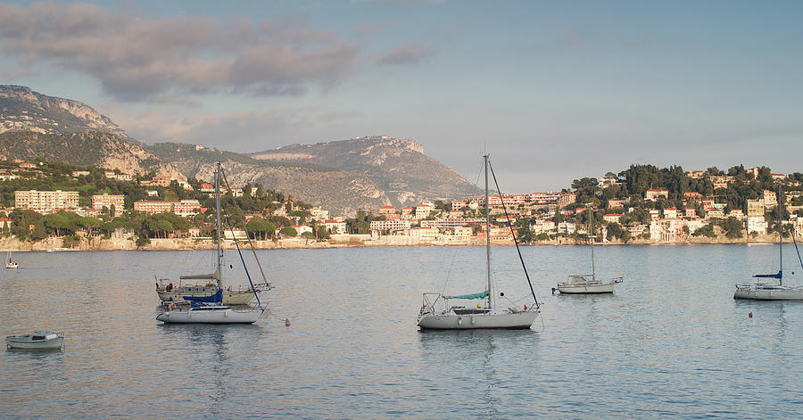 Sailing boats at sunset on Villefranche sur mer in French Riviera Photograph by Jean-Luc Farges