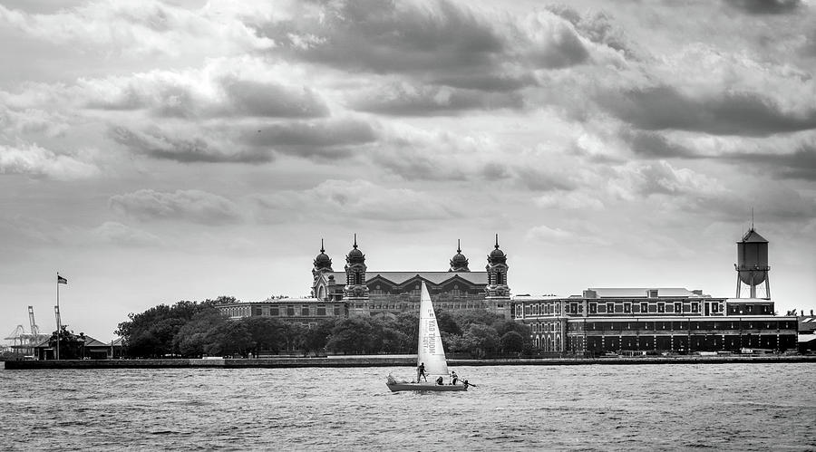  Sailing By Ellis Island In Black and White Photograph by Greg and Chrystal Mimbs