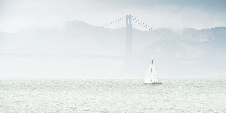 Sailing in the fog in San Francisco bay Photograph by Jean-Luc Farges