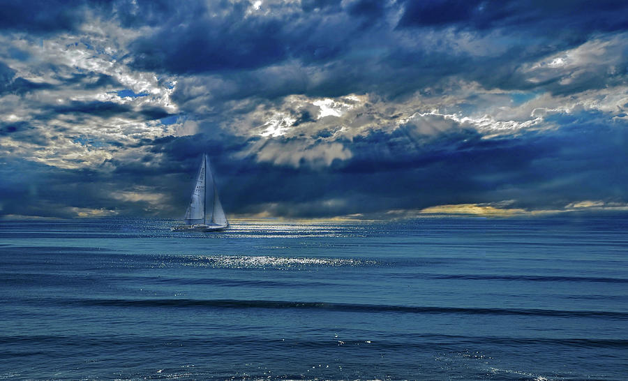 Sailing into the Storm Photograph by Marilyn MacCrakin