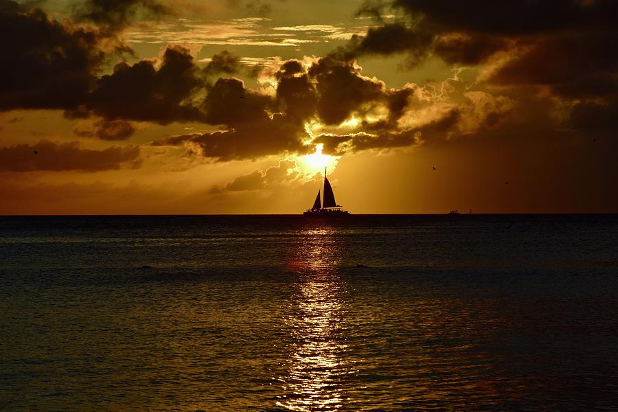 Sailing into the sunset Photograph by Monika Salvan