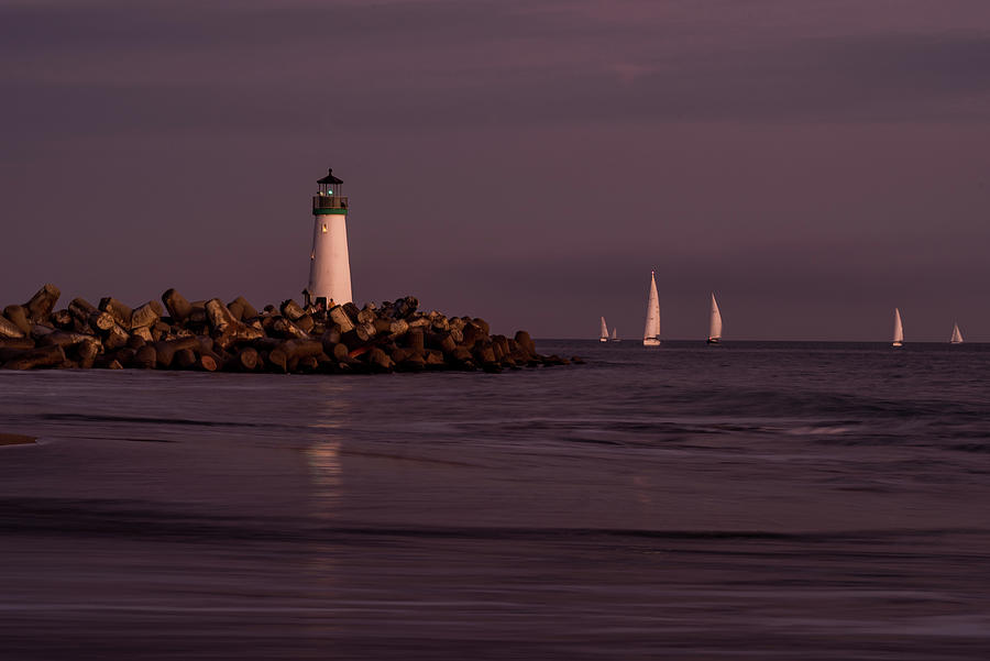 Sailing Lighthouse Photograph by Matt Halvorson Sailing Lighthouse Photograph by Matt Halvorson
