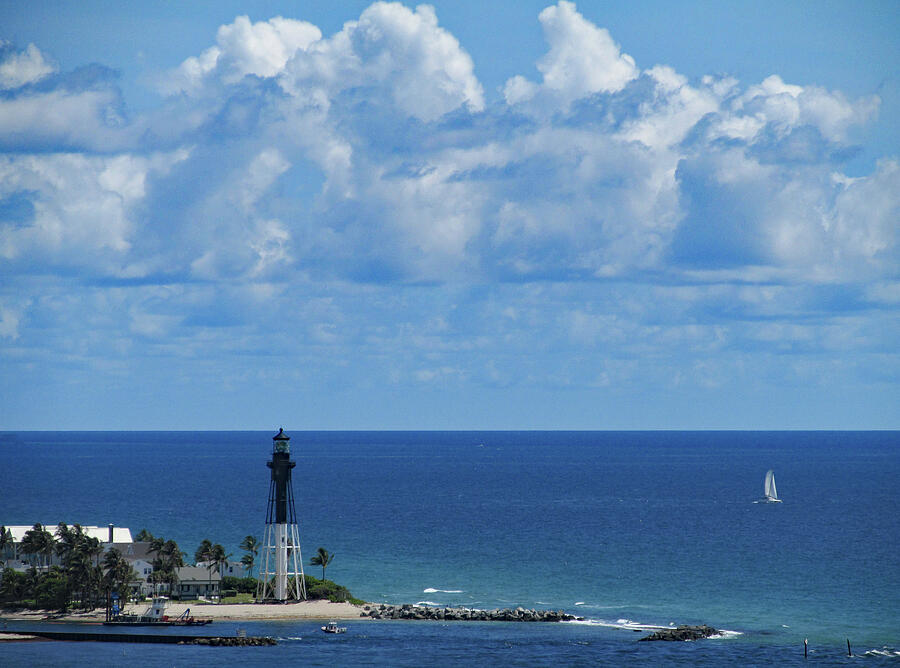 Sailing Past the Hillsboro Inlet Lighthouse in Florida Photograph by Corinne Carroll