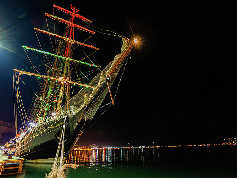 Sailing ship anchored at night Photograph by Umberto Barone