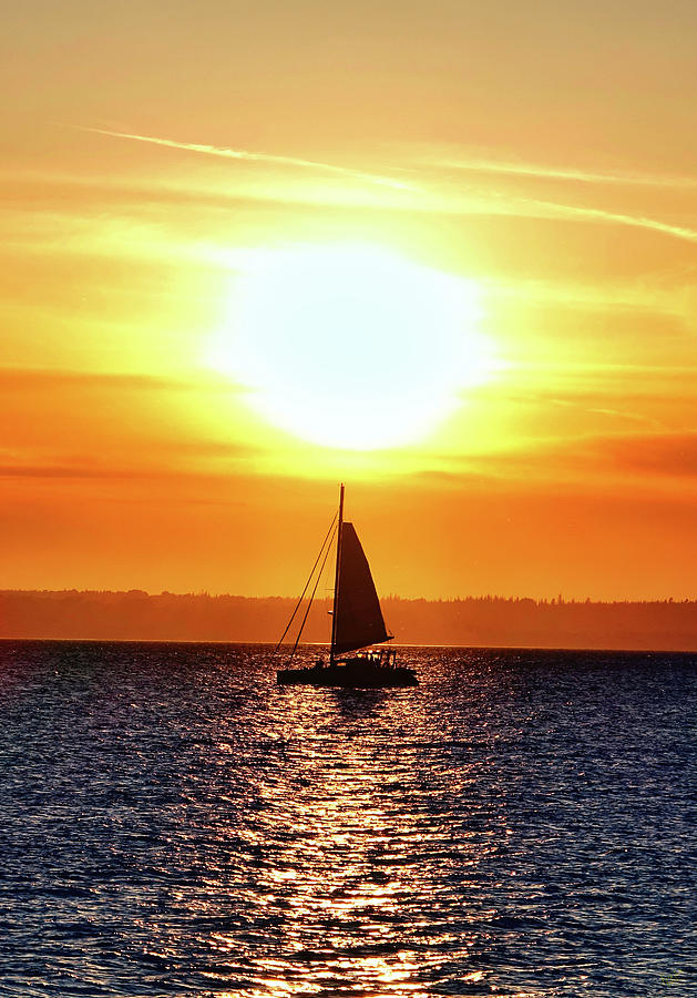 Sailing the Sunset Photograph by Rick Lawler