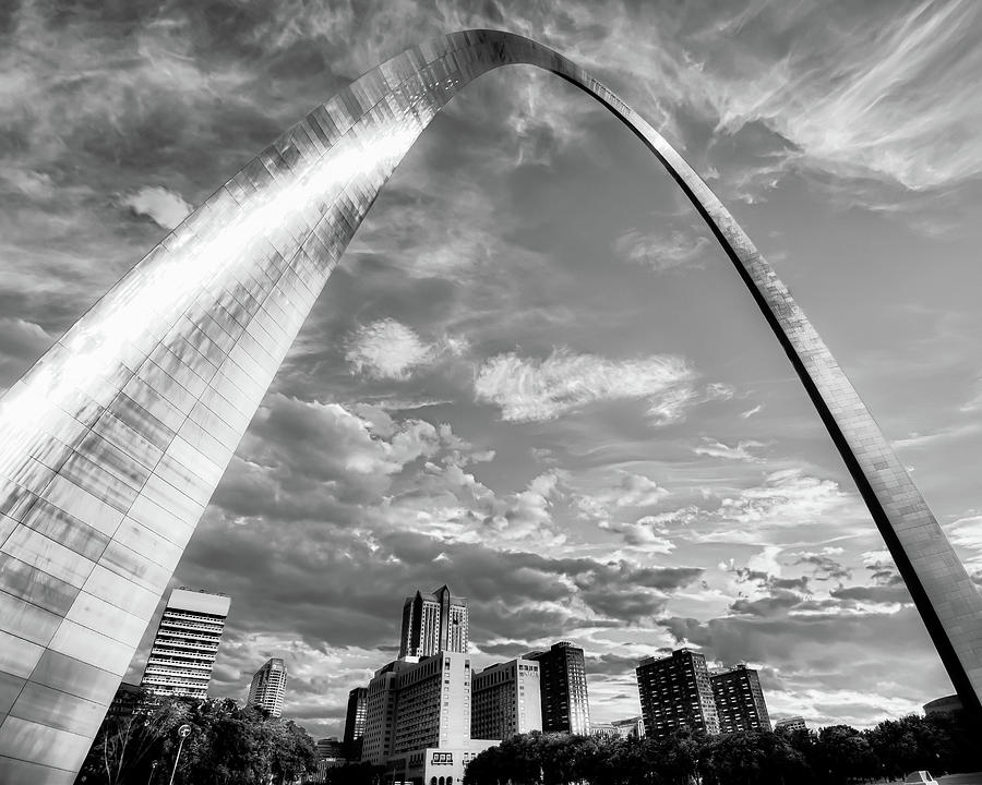 Saint Louis Gateway Arch And Skyline Under Wispy Morning Clouds - Black and White Photograph by Gregory Ballos