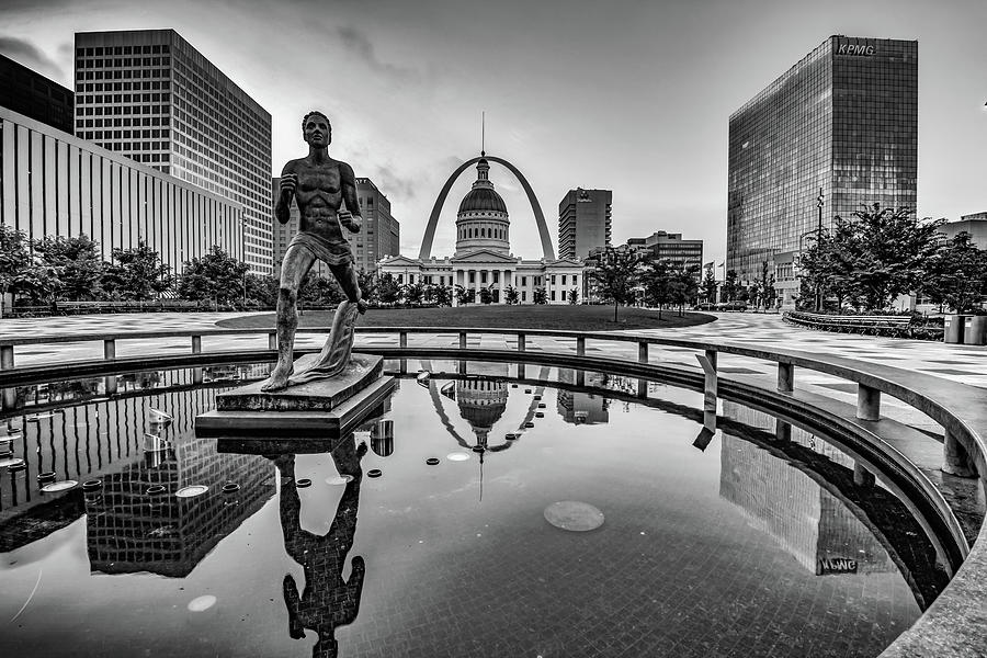 Saint Louis Skyline and Gateway Arch Reflections Over Kiener Plaza Fountain - Black and White Photograph by Gregory Ballos